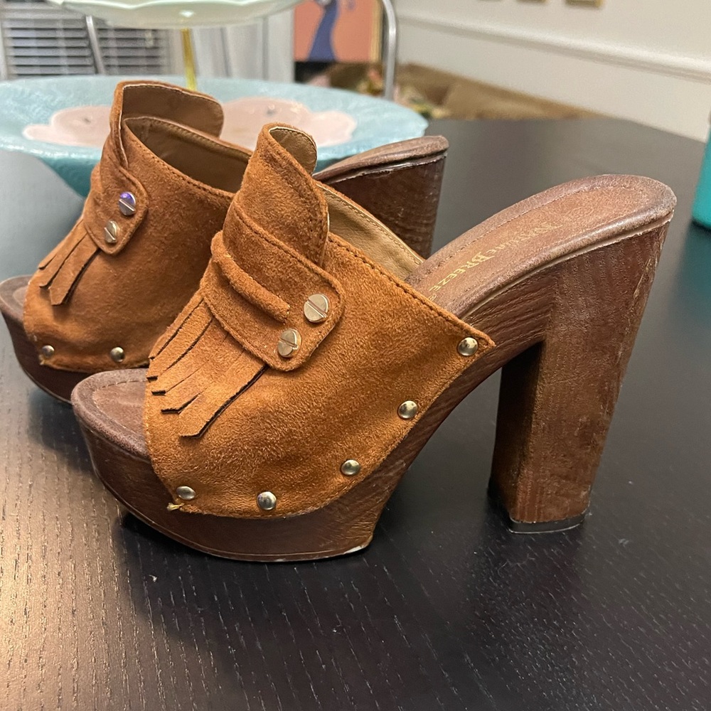 Brown suede wooden heel clogs size 5 1/2. Very comfortable and cute on.